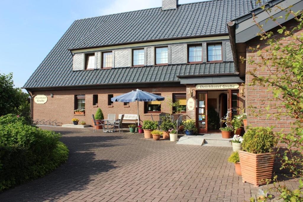 Deichhotel Grube Dorumer Neufeld Exterior foto